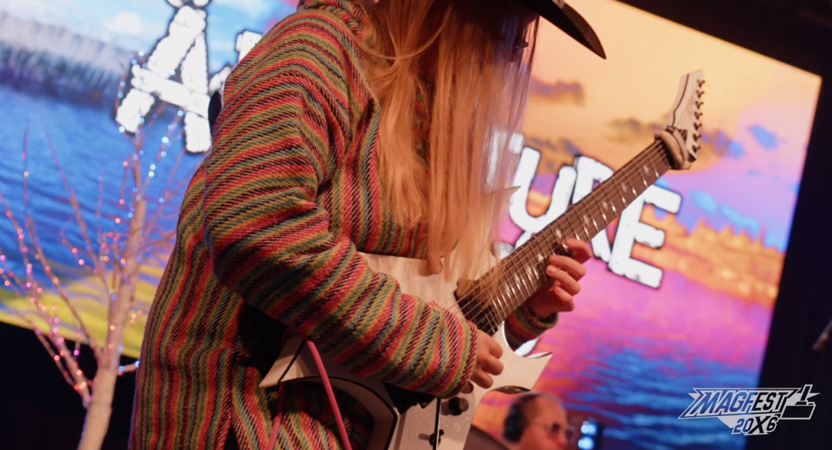 Sybil Grace performing Guitar